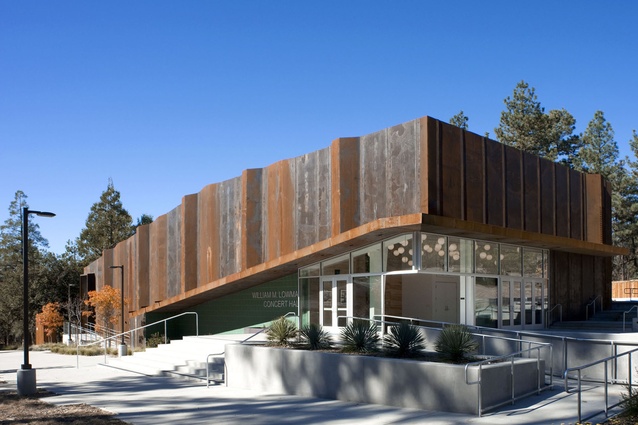 William M. Lowman Concert Hall. Rusted Corten steel was used for the exterior, which blends with other campus buildings and refers to the folded rock and granite landscape of surrounding mountains.