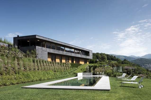 Villa Comano, Switzerland, by Attilio Panzeri & Partners. 2013. The house maximises the view over Lake Lugano and the surrounding countryside with extensive glazing on three sides.