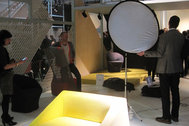 Benjamin Hubert with one of his chairs at the Moroso stand. 