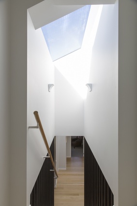 A skylight brings plenty of natural light into the centre of the home.