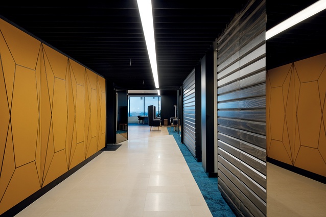 The custom-built leather panels are by MMi and Targetti provided linear lighting.