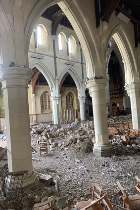 Debris on the floor of the nave prior to clearance.
