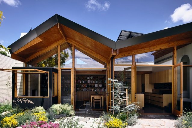 Generous double-doors provide views to the patio and make it easy for guests and fresh air to circulate.