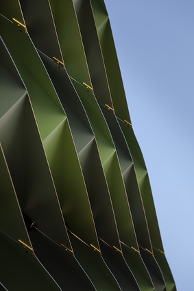 Zespri’s façade is composed of folded aluminium sun shades.