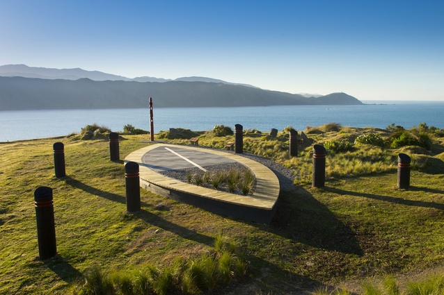 The mythical waka overlooks the Wellington heads, with the pouwhenua aligned to the distant Orongorongo Mountains. 