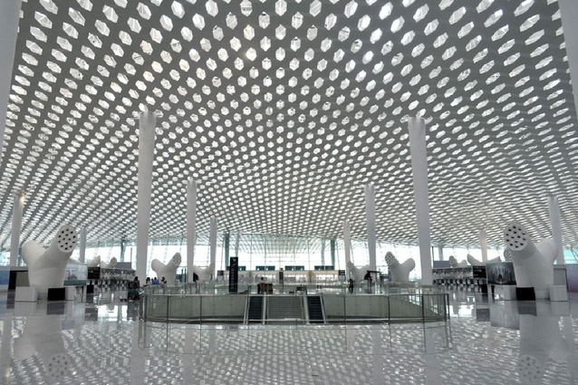 Honeycomb shaped roof panels punctuate the roof to allow natural light to filter through.