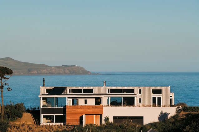 Looking through and over the house above Lyall Bay designed by Athfield Architects, towards Wellington Heads and Cook Strait. 