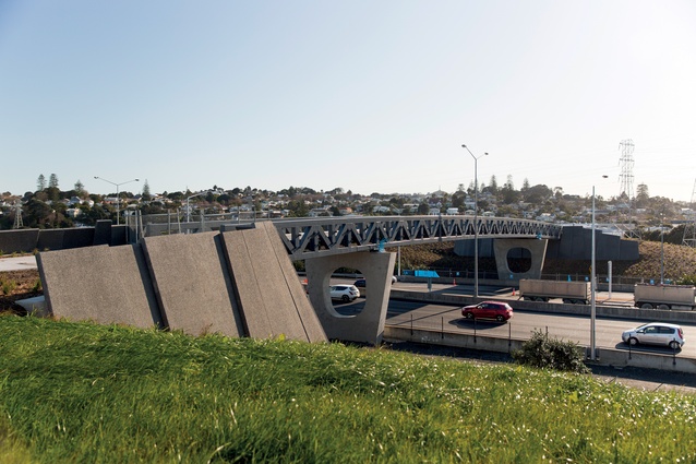 The wide, sloping bridge connects Onehunga to the new foreshore; embankments muffle the noise of passing traffic.