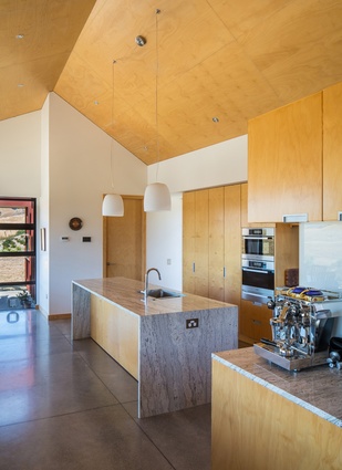 Nohora House. The plywood-clad kitchen.