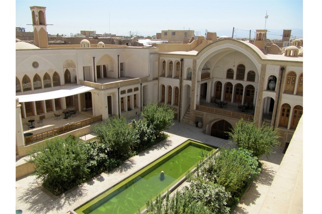 Manouchehri House, Kashan, Iran. Upper view of the courtyard showing southern and eastern wings after restoration.