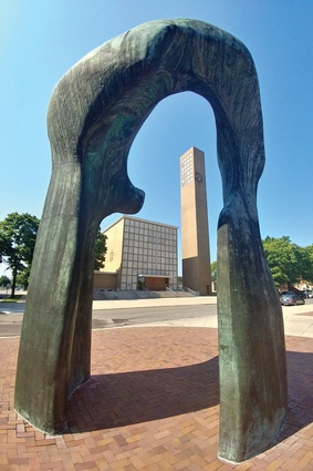 Eliel Saarinen’s First Christian Church is in Columbus, Indiana; here viewed through a Henry Moore Sculpture.
