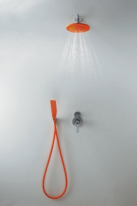 Agape Kaa orange shower fitting adds unexpected colour, also available in green and grey.