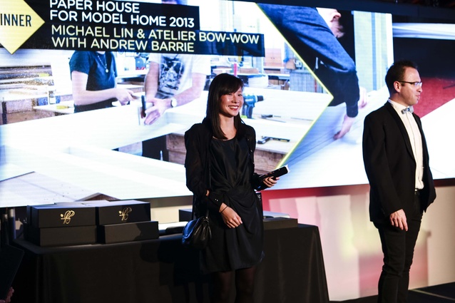 Melanie Pau receiving Installation Award for Paper House Model Home 2013.
