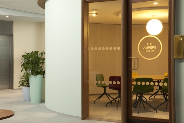 Each meeting room has a title on its door referencing the power-generating industry. 