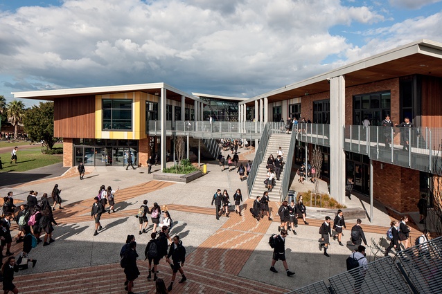 The design focus is straightaway on students, beginning with a series of urban street-like spaces that work their way around the school with two storeys of classrooms on either side. 
