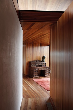 Cedar lining in the interior is juxtaposed with bagged, painted concrete block.