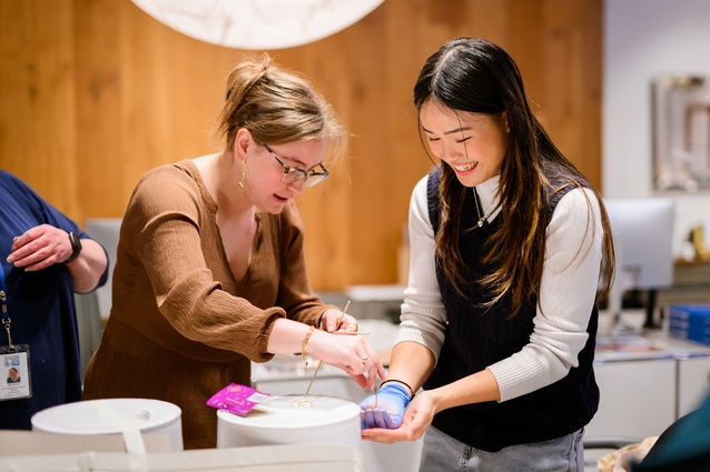 Architecture+Women at work on their creation, which included a wind turbine for renewable energy generation to power the wrecking ball cable car.