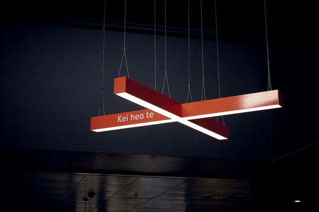 Cross-shaped custom light features relate to themes of wayfinding. There is a text-based component to all the artworks.