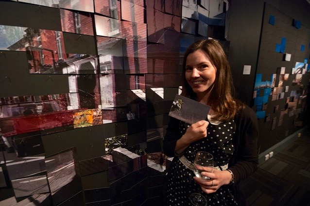 Lucy Fuchsbichler choosing a postcard from the piece <em>Home?</em>