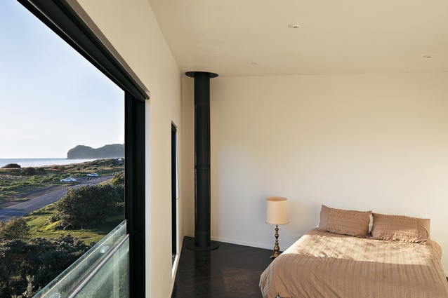 The main bedroom offers views out towards Piha beach.  