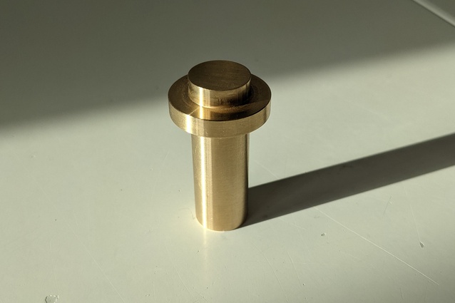 A close up of the first version of the brass component.