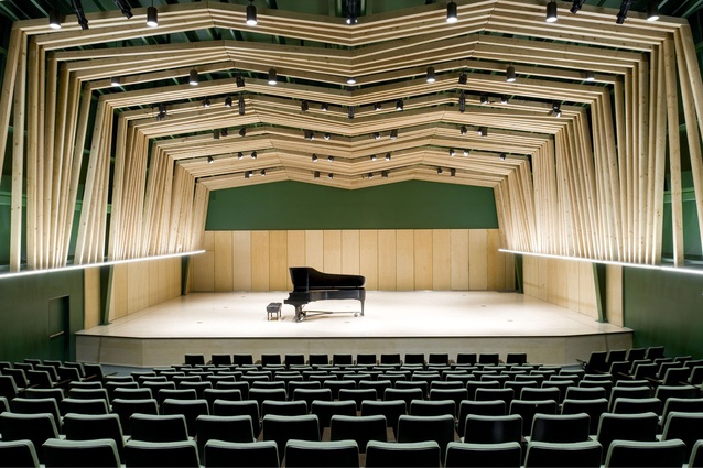 William M. Lowman Concert Hall, California by Sander Architects. The design of the erratically-placed wooden beams was inspired by the forest surrounding the campus that the hall is situated on.