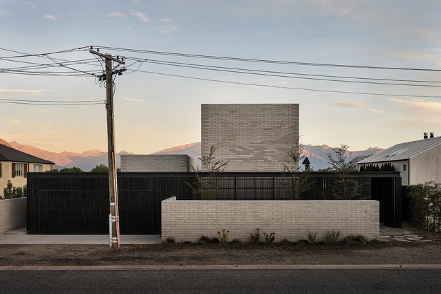 On its south side, the S.K.I. House presents a mute but sculptural face to a suburban street in fast-growing Wānaka.