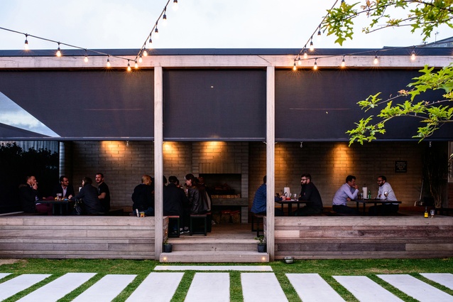 Brothers Brewery and Juke Joint in Auckland, New Zealand by MA Studio. The courtyard is the shining star of this project, inviting customers in with warm timber and whitewashed stone steps.