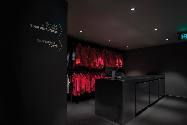 The interior uses a base palette of red, black and white as a nod to Māoridom and as a way to produce a low level of light emissions.