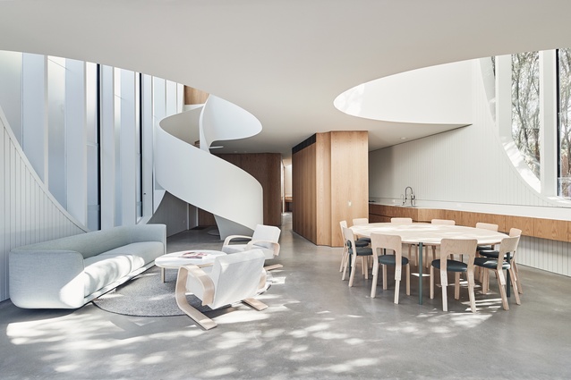 From the spiral stairs to elongated voids, each element is integral to the home’s functionality and the design intent.
