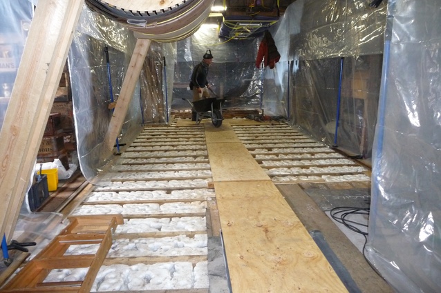 Restoration of the floor in Scott's Cape Evans Hut: The exposed floor shows ice build-up.