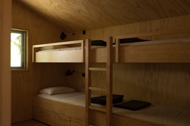 The beds in the upstairs bunk room were designed by the architect.