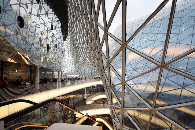MyZeil Mall by Studio Fuksas, in Frankfurt. The sculptural façade has alternating glass and steel panels and is conceived as a river that connects the two sides of the city.