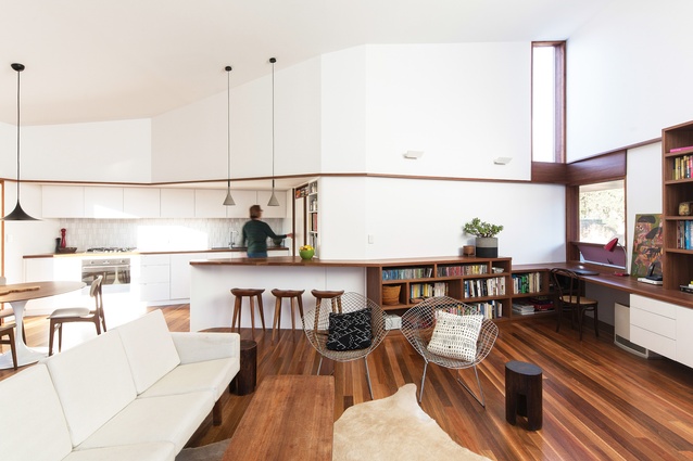 The living area is one large space, broken down using joinery and ceiling heights.