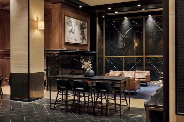 The aesthetic inside Middleton, one of the Queen’s Rise eateries, is timeless and features tan-leather seating, Nero Marquina marble from Spain, edged in thick brass, and Travertine wall tiling. 