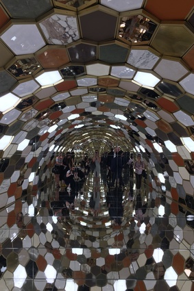 The installation features an opulent hall of mirrors.