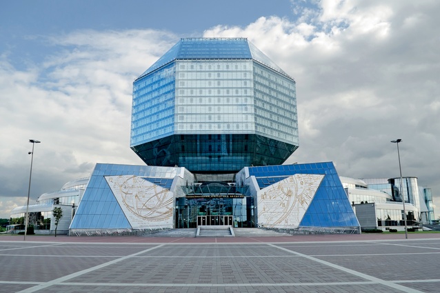 Heat-reflecting glass encapsulates the National Library of Belarus. At night LEDs light up the jewel-like central form. 