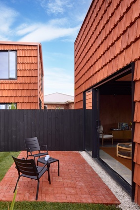 Despite their proximity, the two homes enjoy privacy from one another.