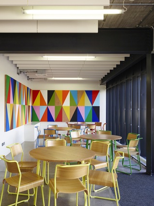 Interior space in Burntwood School: showcasing the colourful murals throughout the campus.