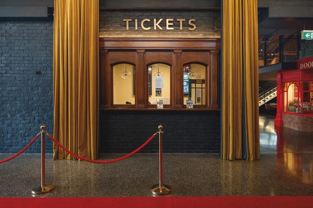 The ticket booth is designed in a retro, classic style.