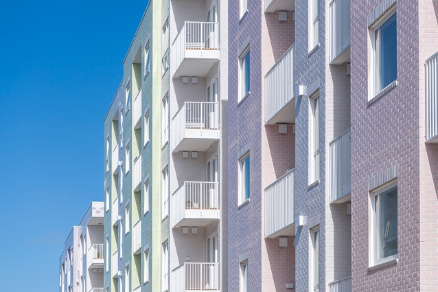 A pastel colour palette of baby
blue, mint green, pink, lilac, and lemon-glazed bricks inspired by the Italian fishing villages of Cinque Terre, adorn the four apartment blocks comprising Manaaki.