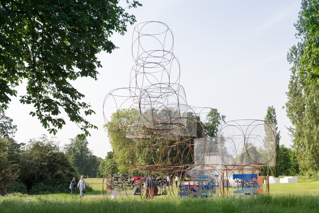 The Serpentine Summer House 2016 designed by Yona Friedman is a 'space-chain' structure that constitutes a fragment of a larger grid structure.