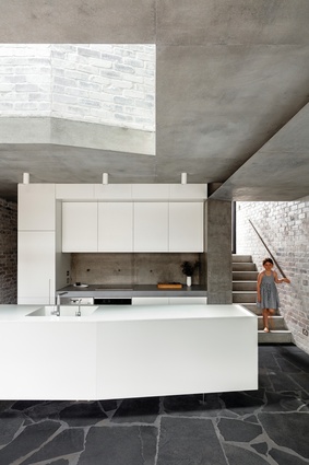 Materials used throughout the addition pay homage to the quality of the sandstone cottage without imitating it.