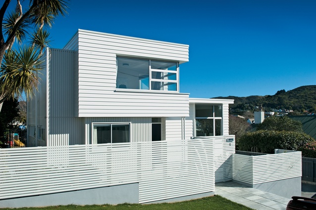 The eastern street elevation of Karori House I shows the three white boxes that form the exterior.
