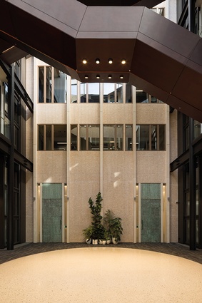 A light-filled atrium at the building’s centre is the main circulation space connecting all levels.