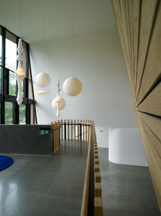 The hanging Noguchi lamps add an organic atmosphere to the lobby.