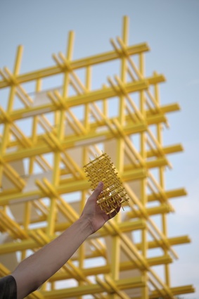 What first appears as a mass of yellow sticks quickly becomes layers of intersecting nodes, 108 in total.