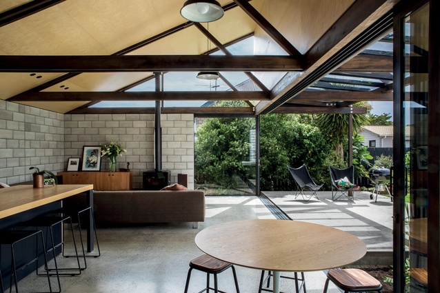 The open-plan kitchen, dining and living area opens out into the courtyard/back garden.