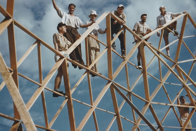 Smith (waving), erecting the dome with friends and students.