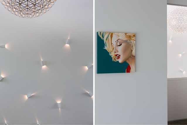 One of the clients has an interest in astronomy which is reflected in several visual features including a Mooi, star-like pendant in the foyer. 